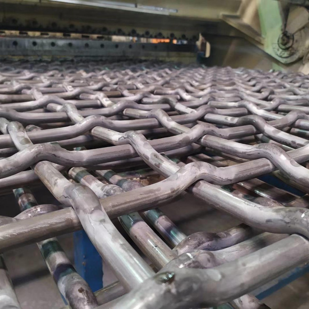 Lock crimp woven screen mesh for iron ore classification systems.