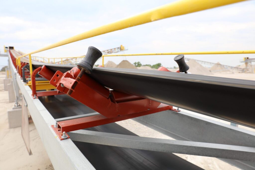 Conveyor Belt (8) Iron ore conveyor belt wear in a mining transfer loading zone