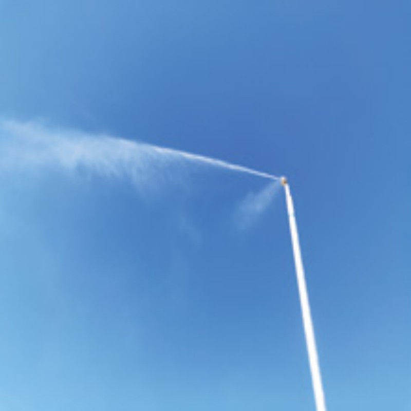 Dust suppression system for mining conveyor transfer point