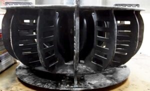 flotation4 Comparison of new and worn flotation rotor components on inspection bench