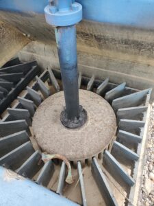 flotation5 Worn flotation rotor with eroded blade edges compared to a new polyurethane replacement rotor.